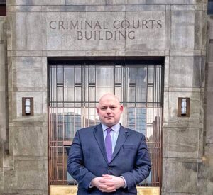 Peter Barta in front of the criminal court building